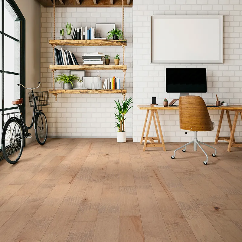 Hardwood flooring in home office with white brick walls | Pilot Floor Covering